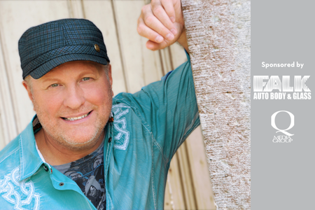 Collin Raye leaning on wall