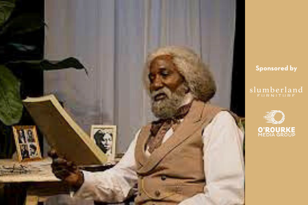 Man in chair reading a book