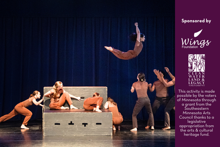 Dancers coming out of a box and one leaps into the air