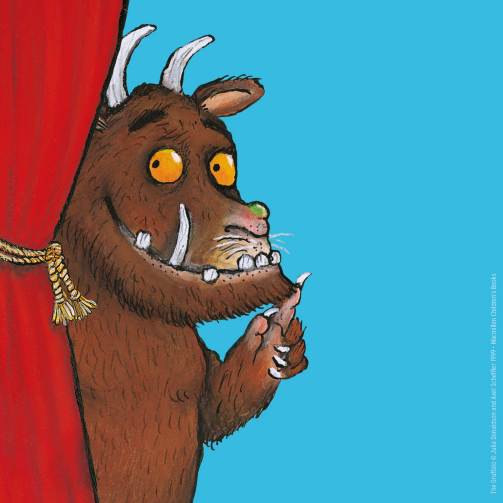 the gruffalo - a made up animal peeking behind a curtain