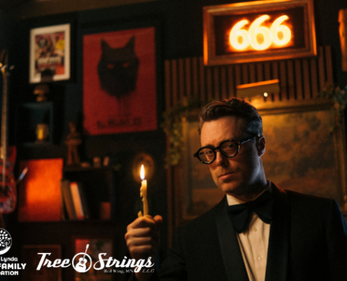 jeremy messersmith All Hallows' Eve - Oct 30 man holding candle in a dark room