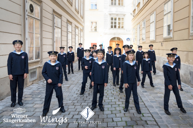 Vienna Boys Choir - Nov 20 boys standing in an alley dressed like sailors