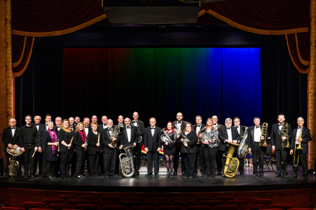 Sheldon Theatre Brass Band Spring Concert - Apr 25 Brass band standing on stage holding instruments